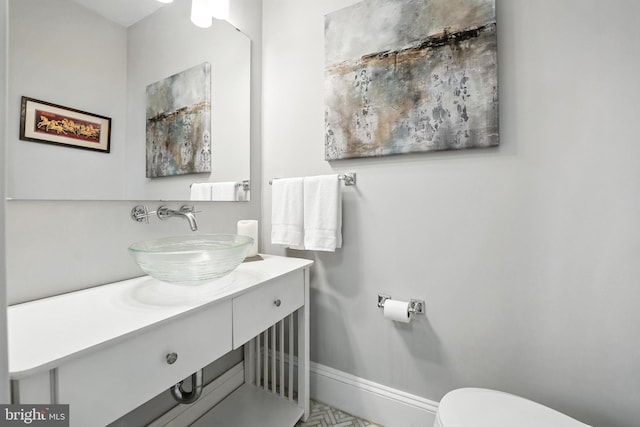 3831 Fulton St NW, Washington, DC 20007 - bathroom featuring baseboards and vanity