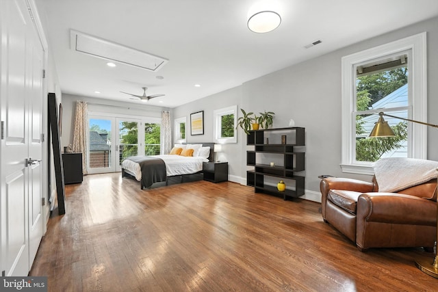 3831 Fulton St NW, Washington, DC 20007 - bedroom featuring attic access, access to outside, wood finished floors, multiple windows, and recessed lighting