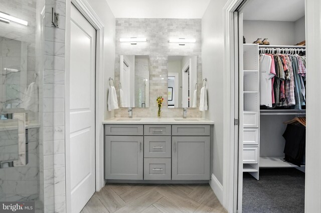 3831 Fulton St NW, Washington, DC 20007 - full bath featuring double vanity, a spacious closet, and a marble finish shower