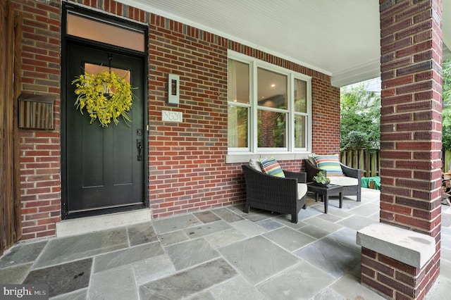 3831 Fulton St NW, Washington, DC 20007 - view of exterior entry featuring covered porch and brick siding