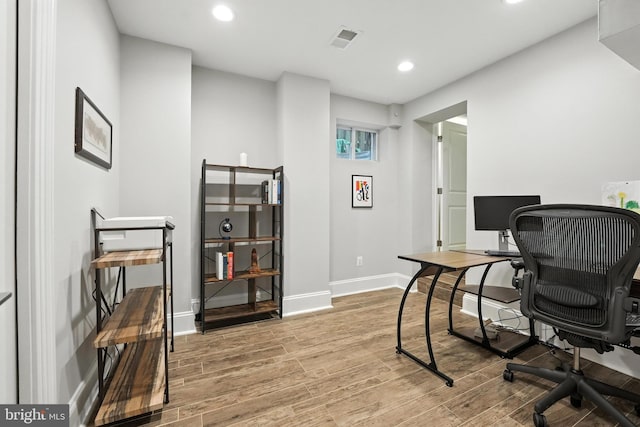 3831 Fulton St NW, Washington, DC 20007 - home office with light wood-style floors and recessed lighting