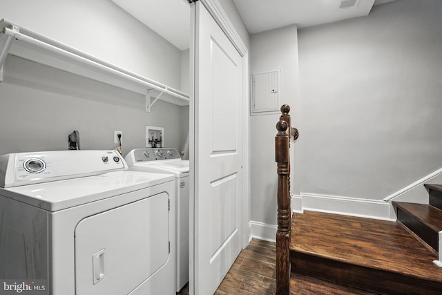 3831 Fulton St NW, Washington, DC 20007 - laundry room featuring washer and clothes dryer, electric panel, and wood finished floors