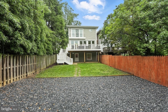 3831 Fulton St NW, Washington, DC 20007 - back of property with stairs, a wooden deck, and a fenced backyard
