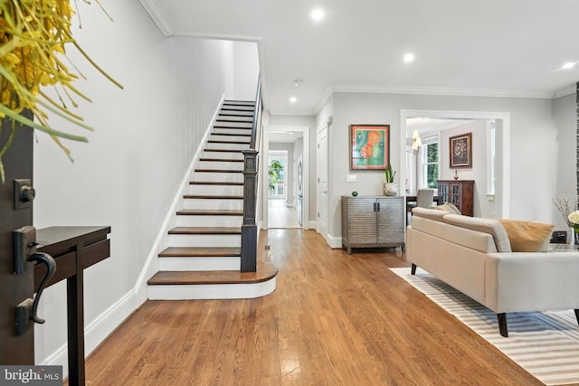 3831 Fulton St NW, Washington, DC 20007 - foyer featuring stairway, recessed lighting, healthy amount of natural light, wood finished floors, and ornamental molding