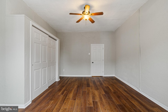 6539 Berdan St, Philadelphia, PA 19119 - unfurnished bedroom with dark wood finished floors, a closet, and ceiling fan