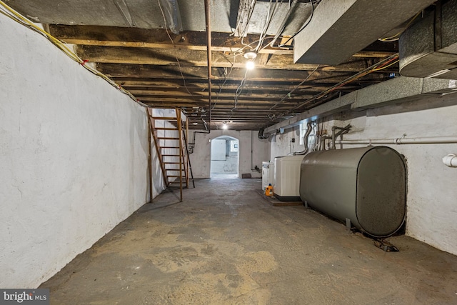 6539 Berdan St, Philadelphia, PA 19119 - basement with heating fuel, a heating unit, and stairway