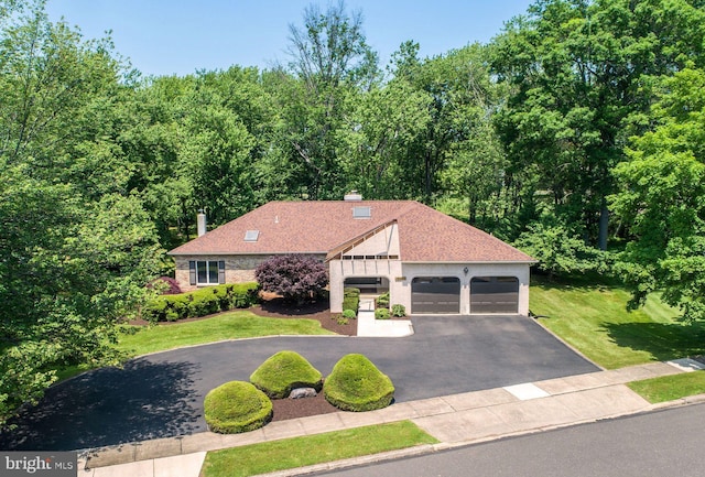 2381 Greensward S, Warrington, PA 18976 - view of front facade with a garage, asphalt driveway, a front lawn, and a shingled roof