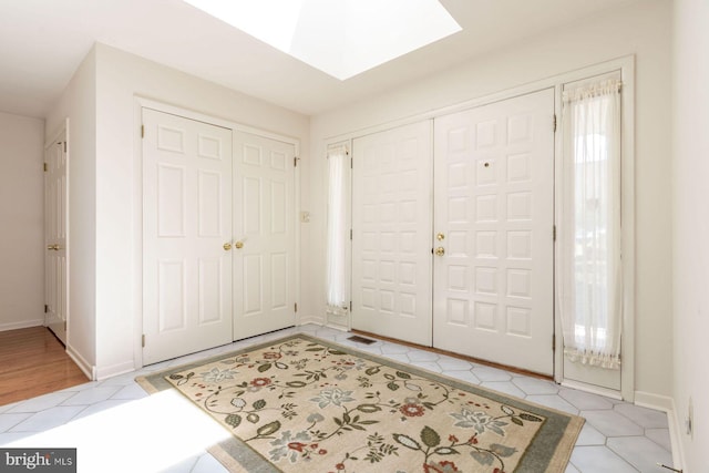 2381 Greensward S, Warrington, PA 18976 - foyer featuring a skylight and light tile patterned flooring