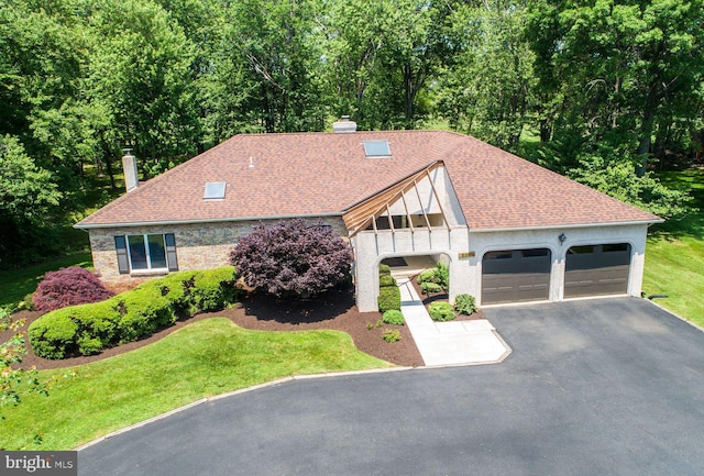 2381 Greensward S, Warrington, PA 18976 - view of front of property with a chimney, an attached garage, driveway, roof with shingles, and a front yard