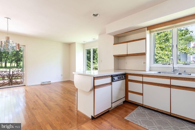 2381 Greensward S, Warrington, PA 18976 - kitchen featuring a peninsula, light wood-type flooring, light countertops, white cabinetry, and recessed lighting