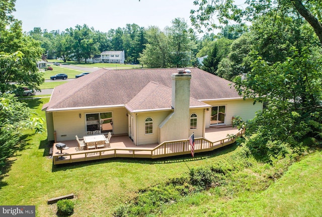 2381 Greensward S, Warrington, PA 18976 - back of property with a yard, a chimney, a wooden deck, and roof with shingles
