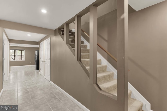 12177 Flowing Water Trl, Clarksville, MD 21029 - stairway with baseboards and recessed lighting