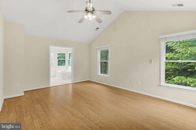 12177 Flowing Water Trl, Clarksville, MD 21029 - empty room featuring ceiling fan, light wood-type flooring, and high vaulted ceiling