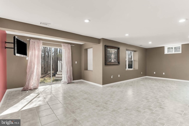 12177 Flowing Water Trl, Clarksville, MD 21029 - spare room featuring healthy amount of natural light, recessed lighting, stairway, and light tile patterned floors