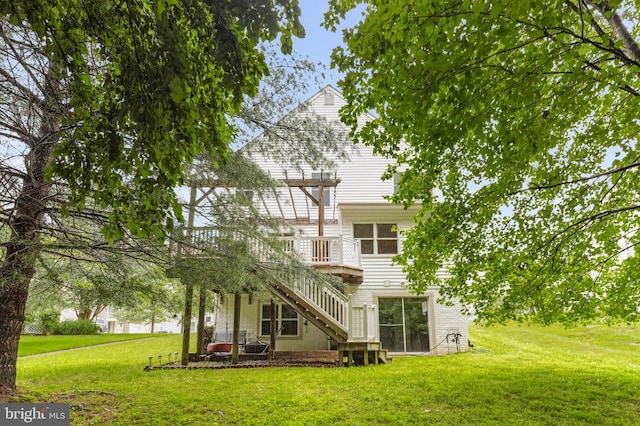 12177 Flowing Water Trl, Clarksville, MD 21029 - back of house with stairs, a wooden deck, and a yard