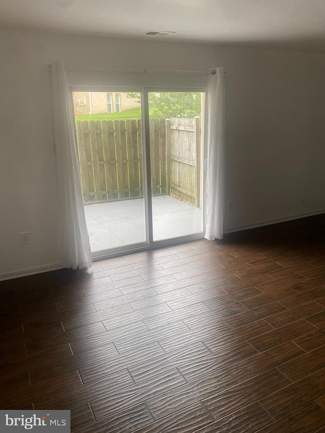 11393 Laurelwalk Dr Unit B-141, Laurel, MD 20708 - spare room with dark wood-style floors and baseboards