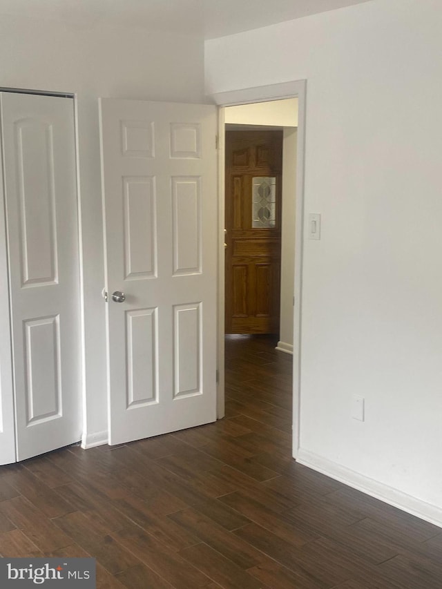 11393 Laurelwalk Dr Unit B-141, Laurel, MD 20708 - empty room with dark wood-style floors and baseboards