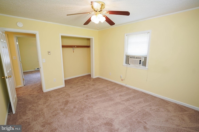 120 Ridgefield Ln, Fruitland, MD 21826 - unfurnished bedroom with ornamental molding, a textured ceiling, carpet flooring, a closet, and cooling unit