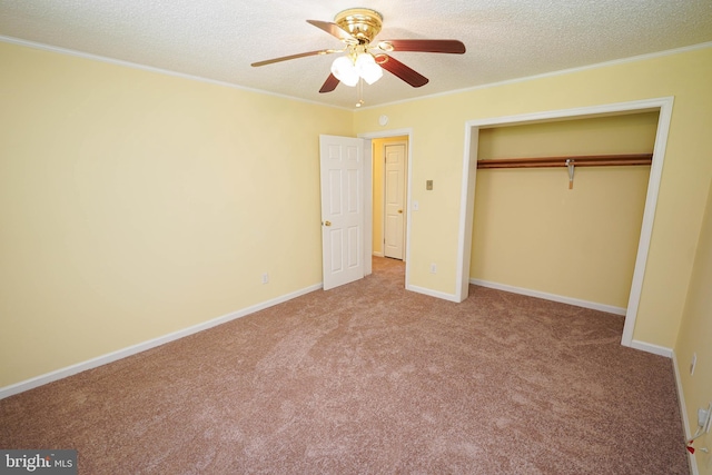 120 Ridgefield Ln, Fruitland, MD 21826 - unfurnished bedroom featuring carpet, a textured ceiling, crown molding, a closet, and a ceiling fan