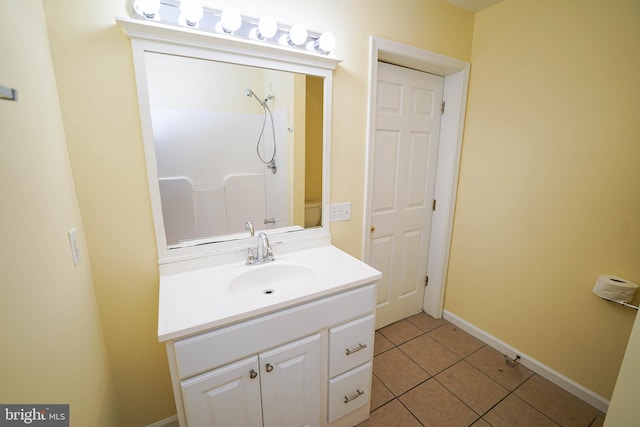 120 Ridgefield Ln, Fruitland, MD 21826 - bathroom featuring vanity, tile patterned floors, and a shower