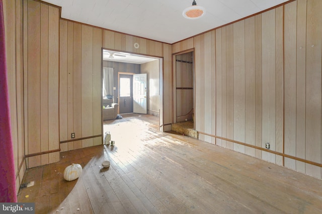 319 1st St, Slatington, PA 18080 - empty room with wooden walls, hardwood / wood-style flooring, and crown molding