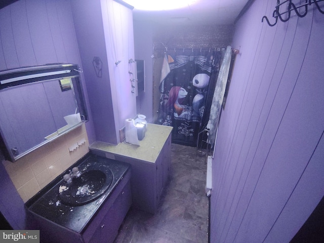 319 1st St, Slatington, PA 18080 - bathroom with decorative backsplash, vanity, a shower, and concrete floors