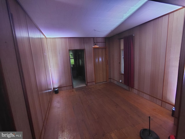 319 1st St, Slatington, PA 18080 - spare room with hardwood / wood-style flooring and wood walls