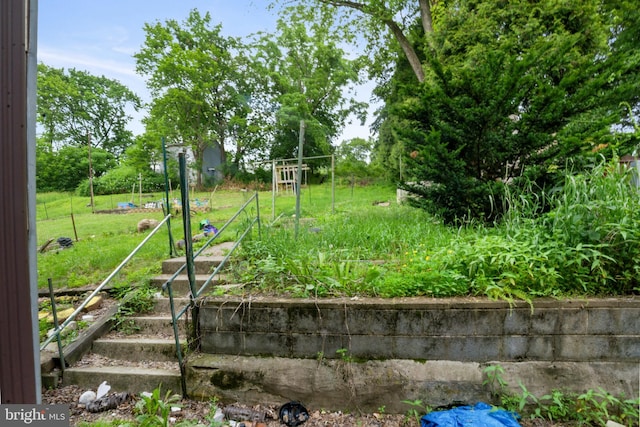 319 1st St, Slatington, PA 18080 - view of green lawn featuring a garden