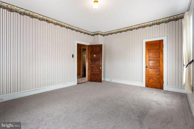 31 4th St, Hanover, PA 17331 - carpeted spare room with wallpapered walls