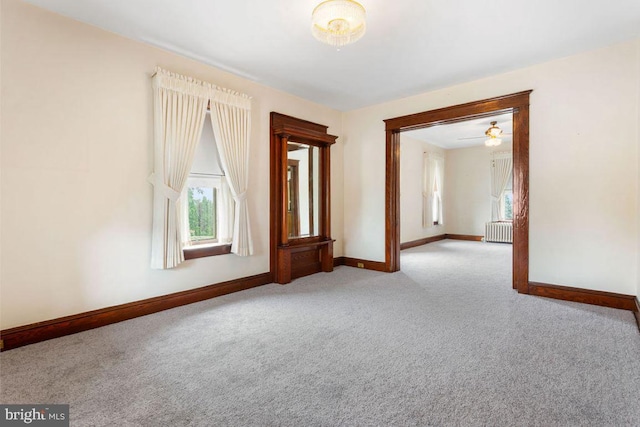 31 4th St, Hanover, PA 17331 - carpeted spare room featuring radiator and plenty of natural light