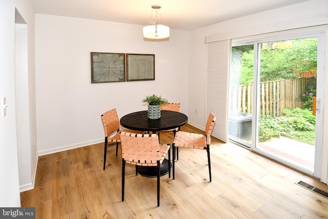 9835 Saint Cloud Ct, Fairfax, VA 22031 - dining room featuring light wood-type flooring and baseboards