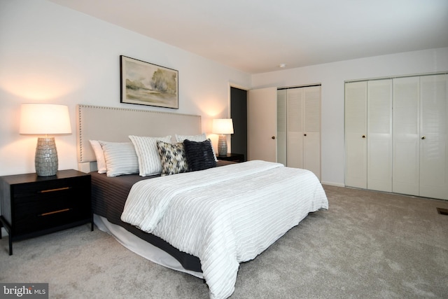 9835 Saint Cloud Ct, Fairfax, VA 22031 - bedroom featuring two closets and light colored carpet