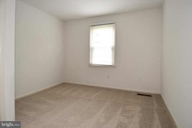 9835 Saint Cloud Ct, Fairfax, VA 22031 - carpeted spare room featuring baseboards