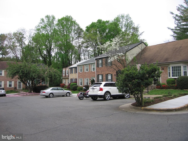 9835 Saint Cloud Ct, Fairfax, VA 22031 - view of asphalt street featuring curbs, sidewalks, and a residential view