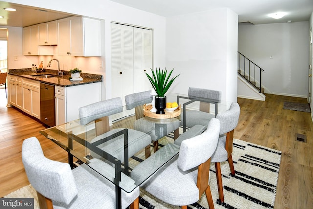 9835 Saint Cloud Ct, Fairfax, VA 22031 - dining space featuring stairway and light wood-style flooring