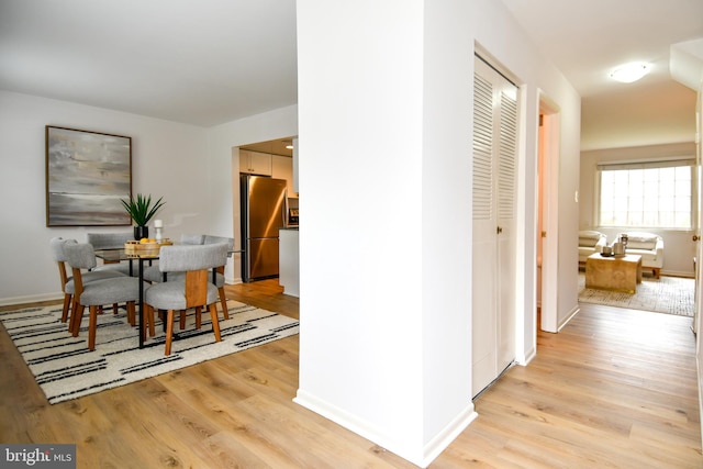9835 Saint Cloud Ct, Fairfax, VA 22031 - dining area featuring light wood-style floors and baseboards