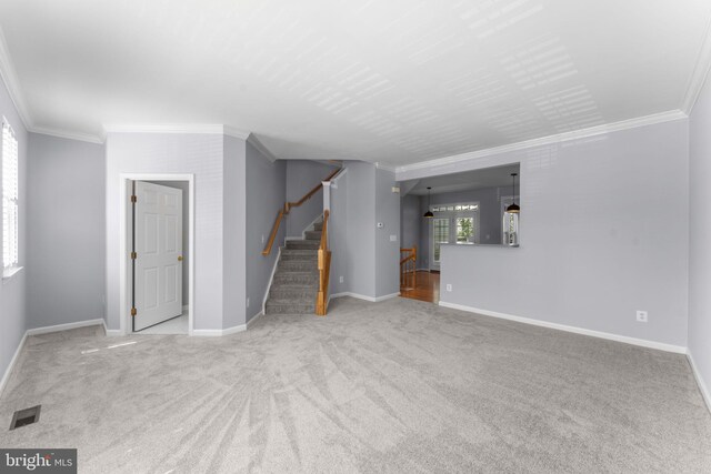 2562 Belcroft Pl, Herndon, VA 20171 - unfurnished living room featuring crown molding, carpet flooring, and stairs