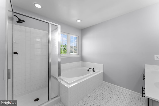 2562 Belcroft Pl, Herndon, VA 20171 - bathroom featuring a stall shower, a garden tub, and vanity