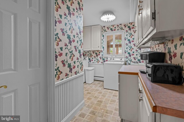 96 Karen Rd, Holland, PA 18966 - washroom with wallpapered walls, washer / clothes dryer, cabinet space, and a baseboard heating unit