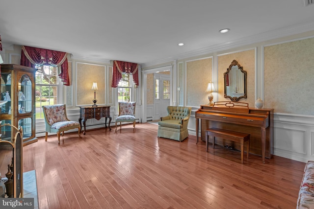 96 Karen Rd, Holland, PA 18966 - sitting room with a decorative wall, plenty of natural light, ornamental molding, wood finished floors, and wainscoting