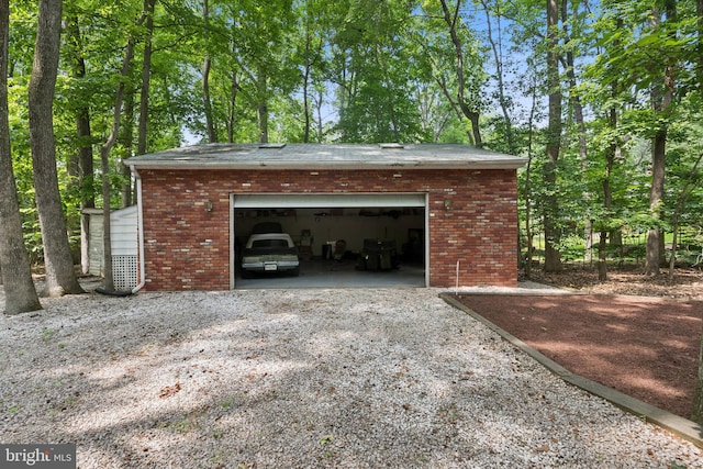 3851 Fawn Ln, White Plains, MD 20695 - garage featuring gravel driveway