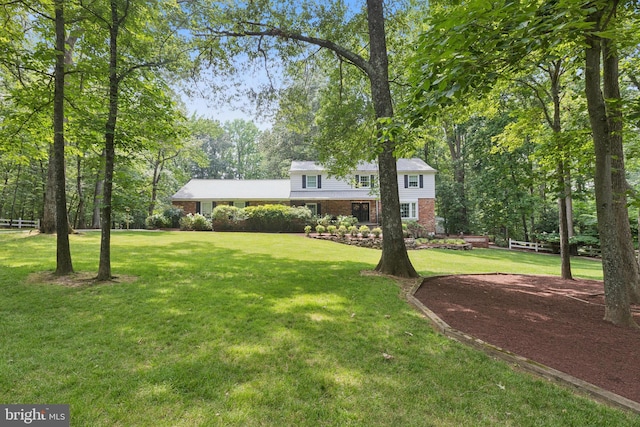 3851 Fawn Ln, White Plains, MD 20695 - view of front of home featuring brick siding and a front yard