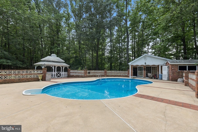 3851 Fawn Ln, White Plains, MD 20695 - view of pool featuring a gazebo, a patio, an outdoor structure, and an exterior structure