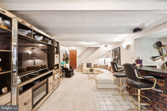 3851 Fawn Ln, White Plains, MD 20695 - living area featuring stairs, carpet floors, and beamed ceiling