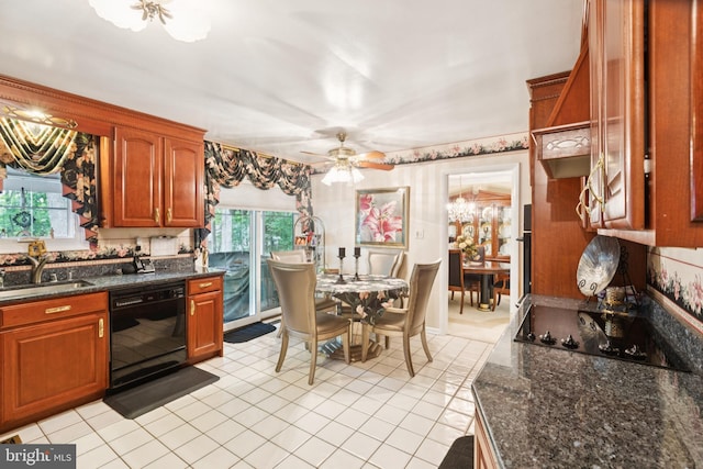 3851 Fawn Ln, White Plains, MD 20695 - kitchen with black appliances, light tile patterned floors, a ceiling fan, dark stone counters, and brown cabinets