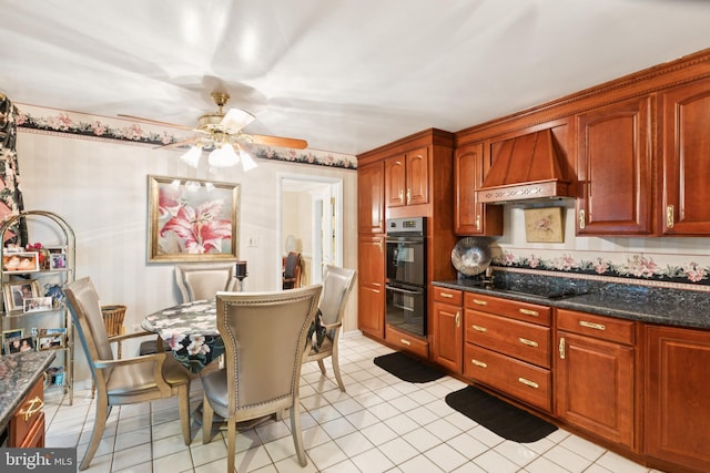 3851 Fawn Ln, White Plains, MD 20695 - kitchen featuring premium range hood, black appliances, ceiling fan, and dark stone counters