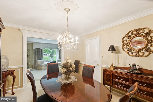 3851 Fawn Ln, White Plains, MD 20695 - dining area with a chandelier, crown molding, and carpet floors