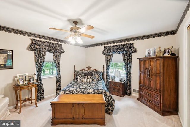 3851 Fawn Ln, White Plains, MD 20695 - bedroom with light colored carpet and ceiling fan