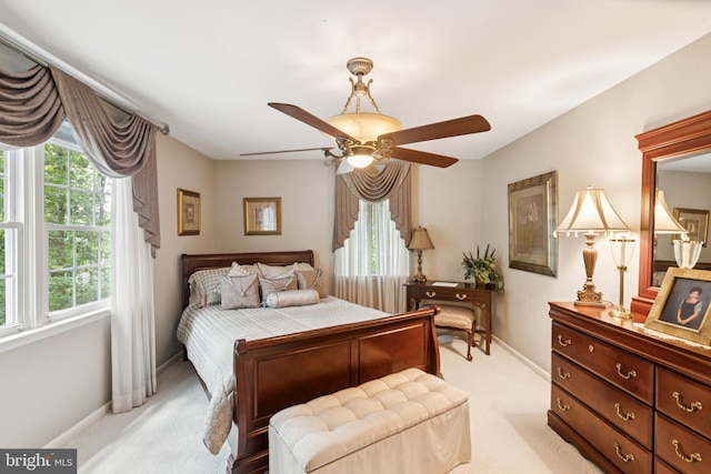 3851 Fawn Ln, White Plains, MD 20695 - bedroom featuring light colored carpet, multiple windows, and ceiling fan