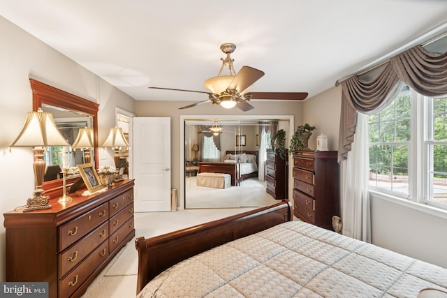 3851 Fawn Ln, White Plains, MD 20695 - carpeted bedroom with a closet and ceiling fan